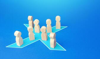People stand in shape of a blue x. Combining forces to successfully solve the problem. Social tension, protest. Unification into a political party. Consolidation, cooperation and collaboration. photo