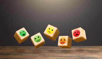 Flying blocks with faces of moods from joy to anger. Conducting a survey. Rating. Approval, indifference, or disagreement. Clients' mood, public opinion. Popularity. Assessment of people's reaction. photo
