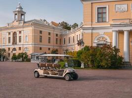 Saint Petersburg, Russia September 30, 2020, Pavlovsk Museum reserve. Walking transport, empty tourist buggy in front of the Palace facade. photo