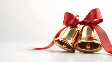 Shiny golden Christmas bells with red satin ribbon bow rendered in 3D, featuring metallic texture and polished brass finish with soft shadows against white background. celebratory photo
