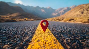Red location pin marker stands out against yellow road line on empty desert highway, with mountain silhouettes and vibrant blue sky creating cinematic travel scene. journey photo