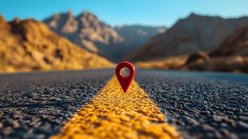 Red location pin marker stands out against yellow road line on empty desert highway, with mountain silhouettes and vibrant blue sky creating cinematic travel scene. indication photo
