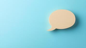 Light blue background features speech bubble cutout in paper craft style, presenting communication concept with beige balloon shape and soft shadow effects. conversation photo