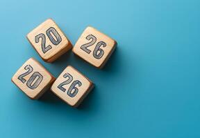 Wooden blocks display the year twenty twenty six photo