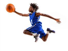 Young athlete performs impressive jump while dribbling basketball in dynamic action shot during practice session indoors photo