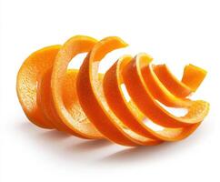 Swirling orange peel created by slicing citrus fruit in a creative way photo