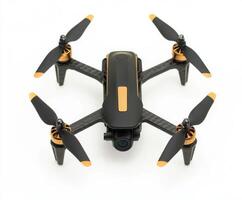 Compact drone with black and gold design ready for flight in a controlled environment photo
