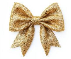 Sparkling golden bow adorned with sequins suitable for festive occasions, celebrations, and gift wrapping photo