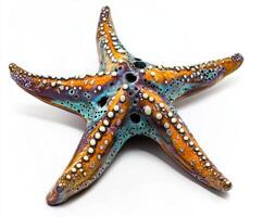 Colorful starfish resting on a surface showcasing vivid patterns and textures found in coastal waters photo