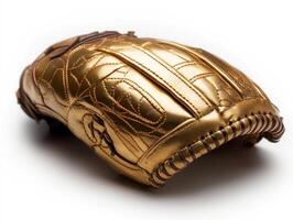 Unique golden baseball glove displayed on a white fabric background highlighting its details and craftsmanship photo