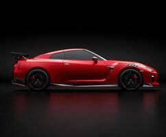 Powerful red sports car showcased against a black background highlighting its sleek design and performance features photo