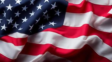 The United States flag is gracefully waving, showcasing its red, white, and blue colors. Stars and stripes symbolize national pride, reflecting freedom and unity. photo
