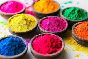 bright powders arranged neatly on a rustic wooden surface with ethnic designs photo