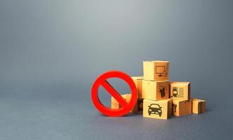 Boxes and red prohibition sign NO. Overproduction of goods, lack of demand. Sanctions and embargo. Shortage of products delivery. Transition of a trading business online. Market changes and adaptation photo