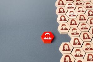 Red person is outside of order system. Refusal to participate, withdrawal in protest. Exit project, dismissal from work. Cooperation and collaboration, teamwork. Strength in unity. Candidate selection photo