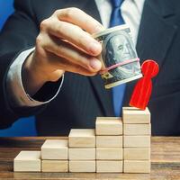 Businessman gets rid of opponent with help of bribery money. Corruption, destructive influence. Political repression. Lobbying, using illegal tools methods. Blackmail officials and senior employees. photo