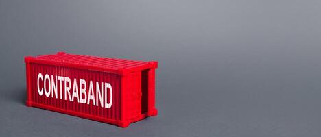 Red cargo shipping container with the word Contraband. Traffic of prohibited goods and products, bypassing customs, smuggling. Corruption, violation of the embargo, circumvention of sanctions. Import photo