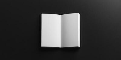 A book is open on a black background photo
