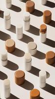 A row of makeup products with different colors and shapes photo