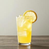 A glass of lemonade with a slice of lemon on top. photo