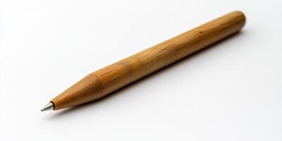 A wooden pencil with a pointy tip photo