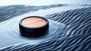 A small container of makeup is floating in the water photo