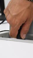 Disconnecting Power Cable from NEMA Plug, Removing Electrical Cord from Outlet, Unplugging Power Connector, Safe Handling of American and Latin Power Systems, Energy Disconnection Demonstration video
