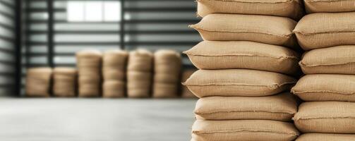 Food security investments. Stacked burlap sacks in a warehouse setting. photo