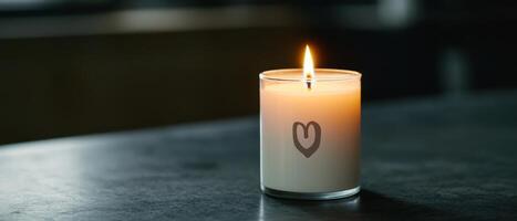 God's unconditional love for valentine's day concept. A lit candle with a heart design, creating a cozy atmosphere. photo