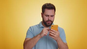 Sad man use smartphone typing browsing loses becoming surprised sudden lottery result bad fortune video