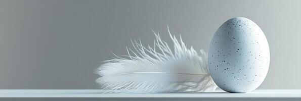 Speckled egg and feather composition reflecting calm stillness photo