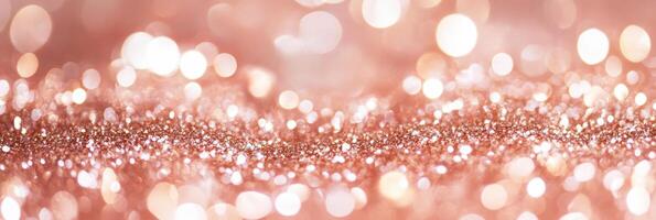 Sparkling rose gold background with abstract blurred glittering bokeh lights photo