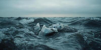 Ocean waves with floating plastic bags highlighting pollution concept photo