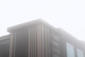 Misty Urban Architecture Capturing the Unique Essence of Foggy Spaces in Cities photo