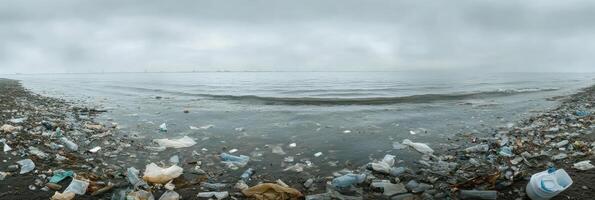 Polluted ocean shoreline with plastic trash and debris highlighting environmental crisis photo
