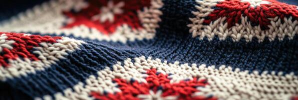 Close-up of blue and red knit fabric with intricate star pattern design photo