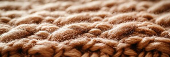 Close-up of warm brown knitted wool texture pattern for fabric background photo