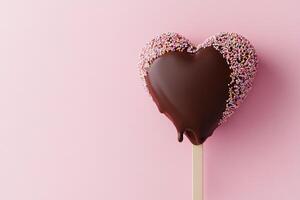 A heart-shaped ice cream bar is dipped in chocolate and covered with colorful sprinkles. The soft pink gradient background enhances its delightful and romantic essence, perfect for sweet moments photo