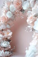 This stunning floral arch features an array of pastel roses, peonies, and soft greenery, beautifully framing a blank space perfect for text or images, creating an elegant and romantic atmosphere photo