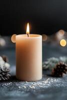 A single glowing candle with a subtle flame radiates warmth, surrounded by softly glowing particles. The dark background enhances its serene ambiance, perfect for branding or text photo