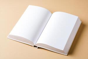 Blank white book on light sand-colored background representing minimalistic design mockup for creative purposes and print projects photo