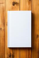 Minimalist book with blank cover on wooden background showcasing simple design for creative mockups or presentations photo