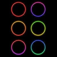 Different color round neon frames. realistic neon circles isolated on transparent background. vector