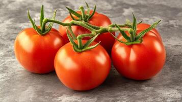 Close-up of a Bunch of Ripe Red Tomatoes photo