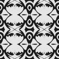 a black and, white pattern with a flower design vector
