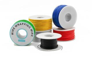 Spools of wire wrapping wire in multiple colors for DIY electronics project photo