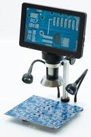 Digital microscope with display for inspecting circuit boards in a workshop photo