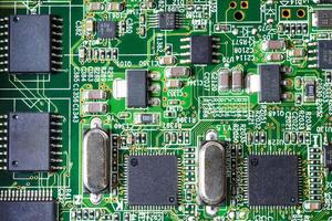 Closeup view of a circuit board of server computer, with microchips and components photo