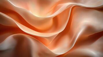 Abstract background of peach colored fabric with soft folds and waves. photo