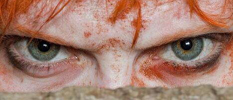 Close up of angry womans eyes photo